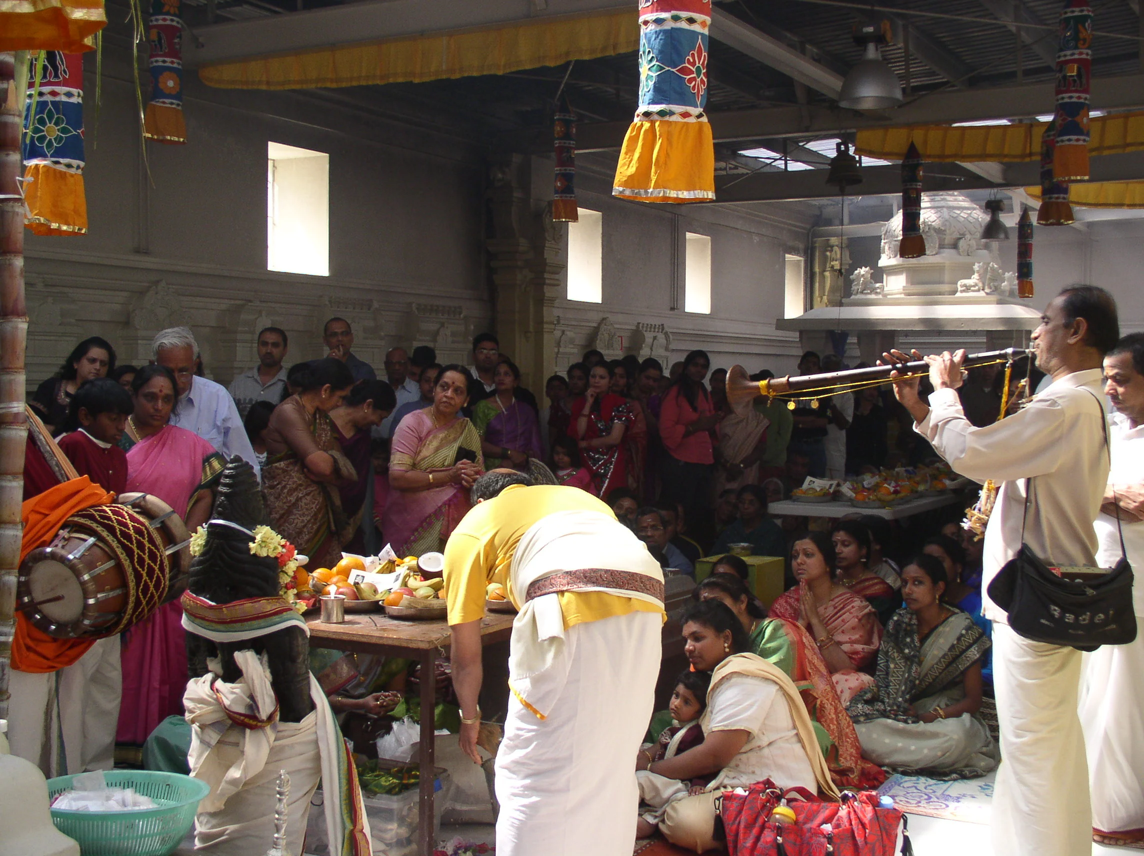 Darsan for Ganesha, prostrating on the floor, musical offerings