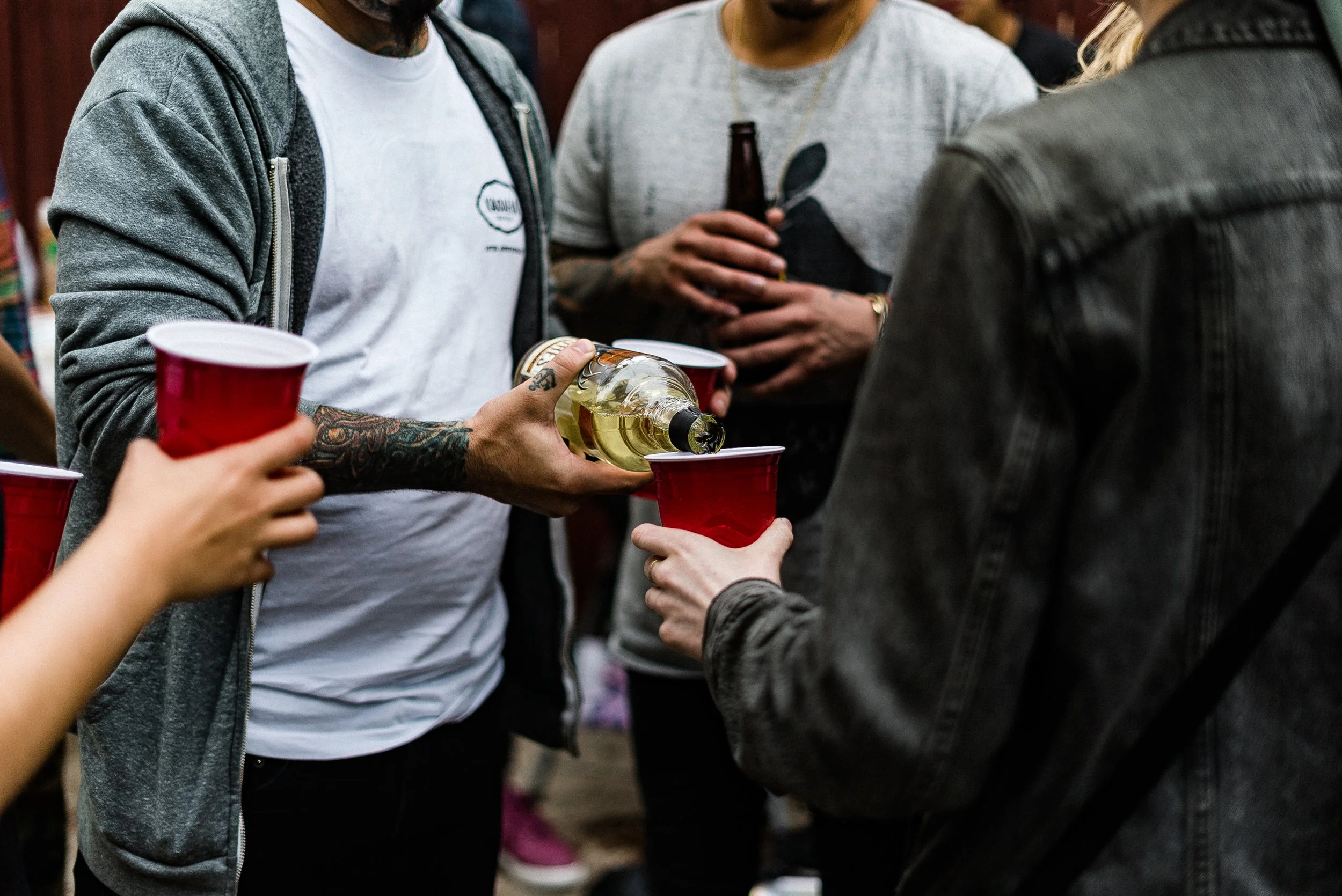 Friends and family gather round toasting to health and life.