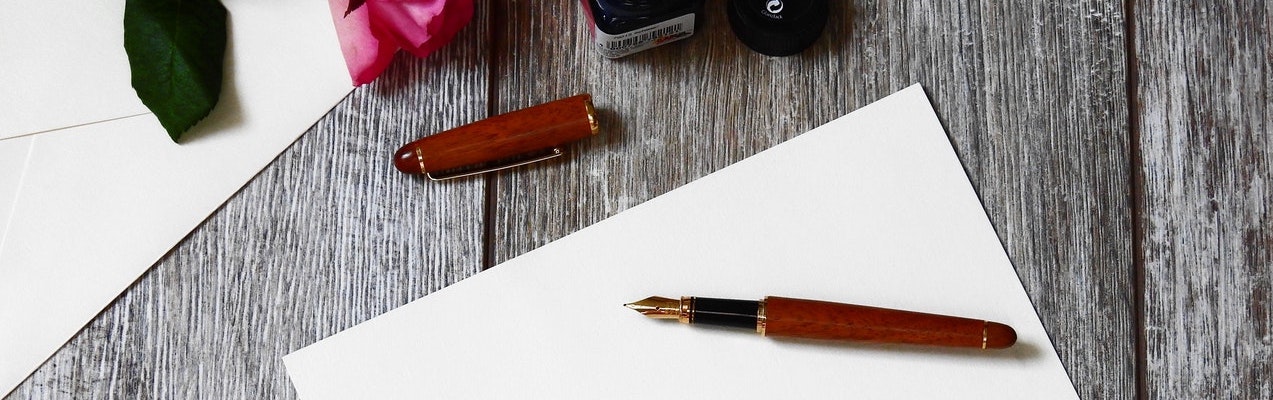  aerial view of fountain pen on a sheet of paper 