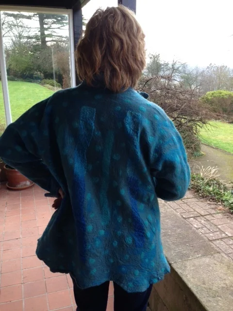 Jade green jacket back view.JPG