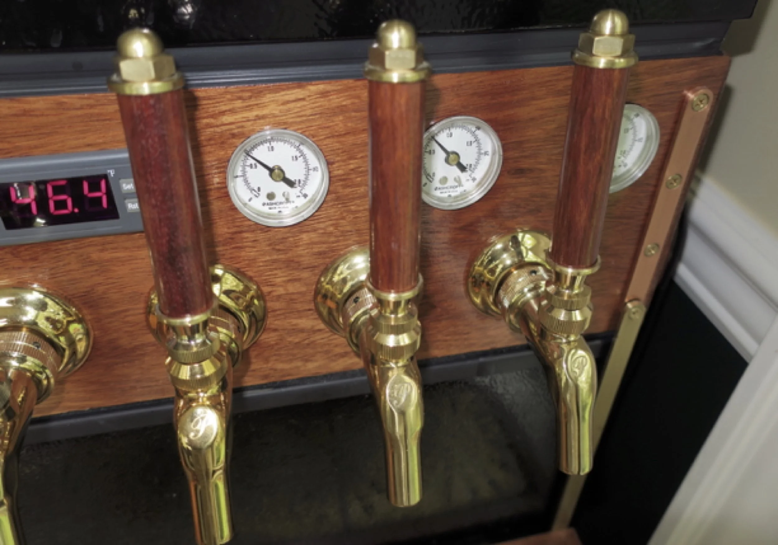 Pressure gauges on the tap for each keg.