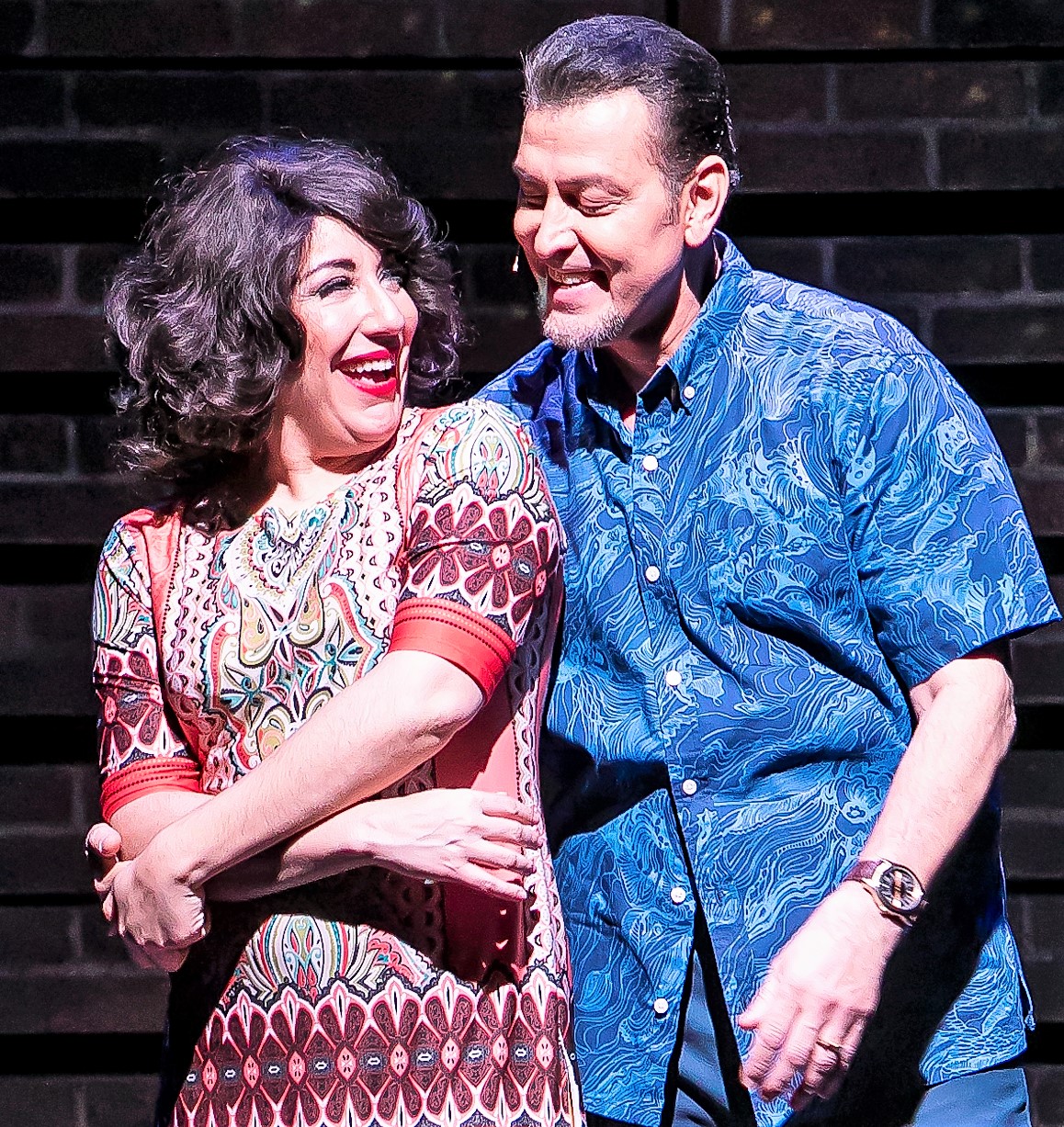 Top: The cast sings. Photo by Eduardo Resendiz Gomez. Shadia Fairuz and Domingo Quiñones star in the Puerto Rico Traveling Theater production I Like It Like That. Photo by Marisol Diaz.