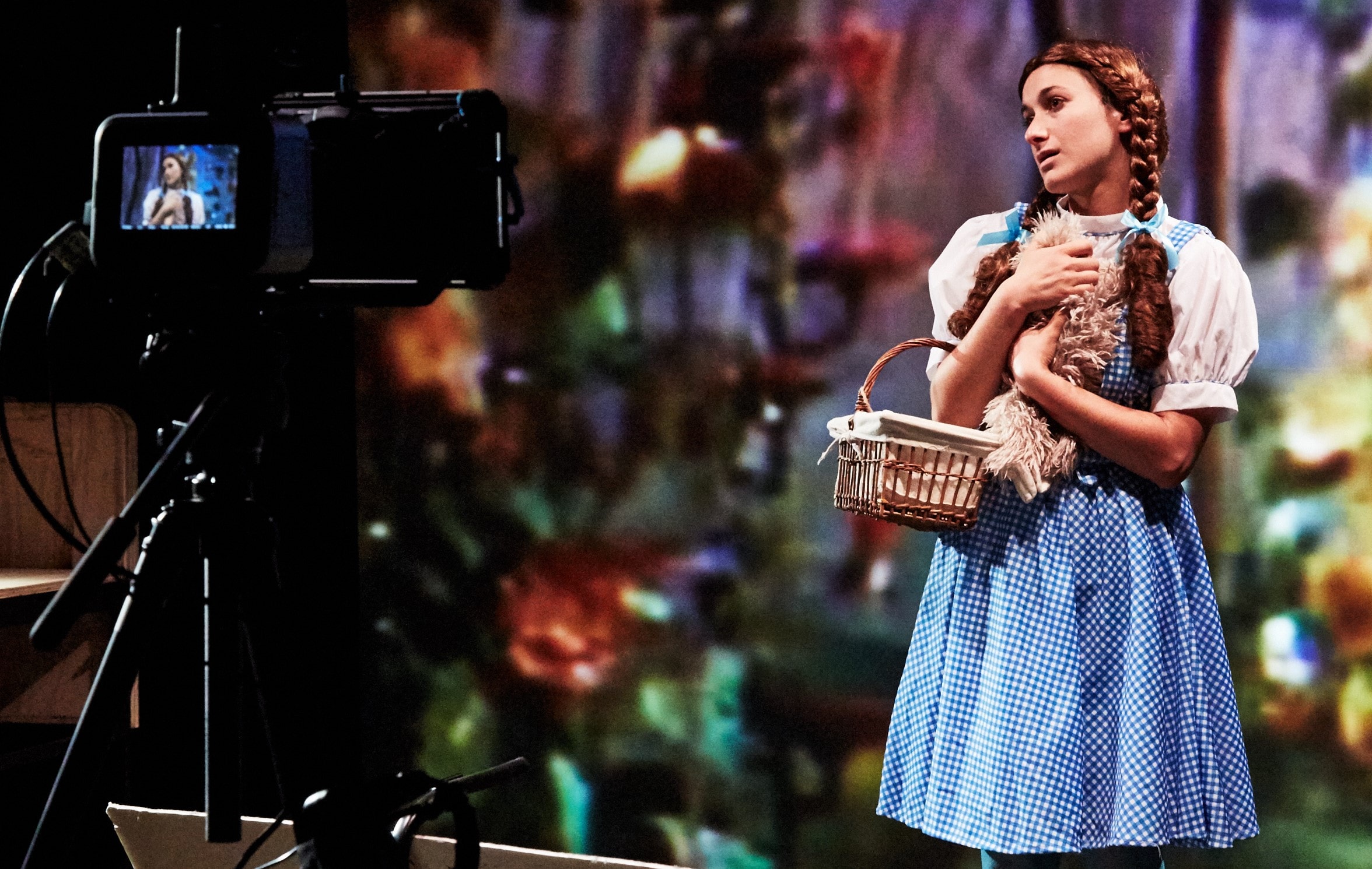 Hannah Heller takes her turn as Dorothy in Elements of Oz . Top: A stage view of the production. Photos by Gennadi Novash.