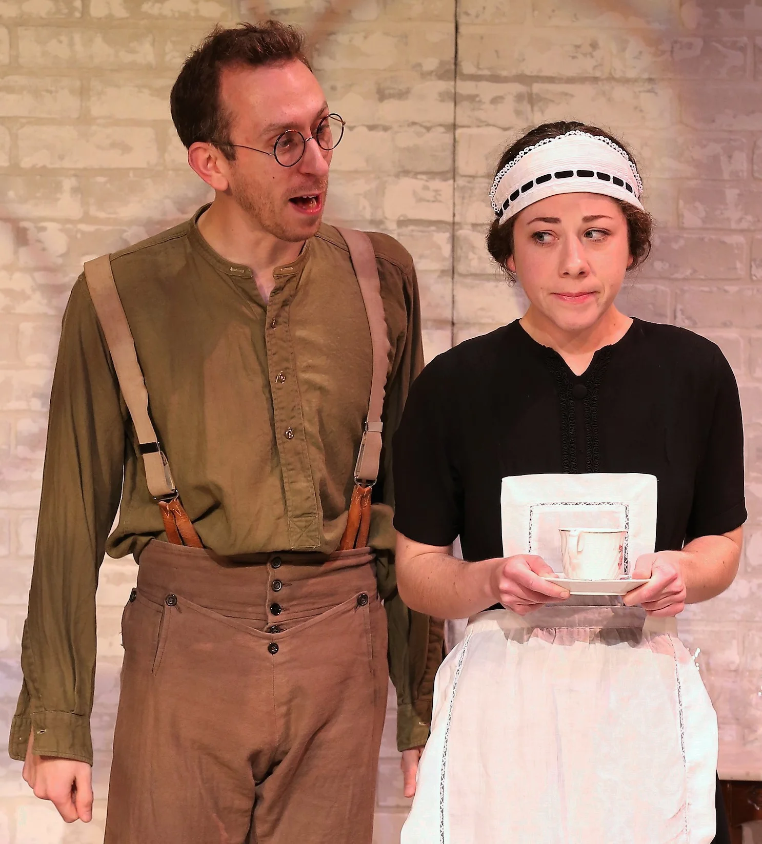 Steven Blakeley (left) is Comrade Staggles, and Annie Jackson is the maid Alice. Photographs by Carol Rosegg.