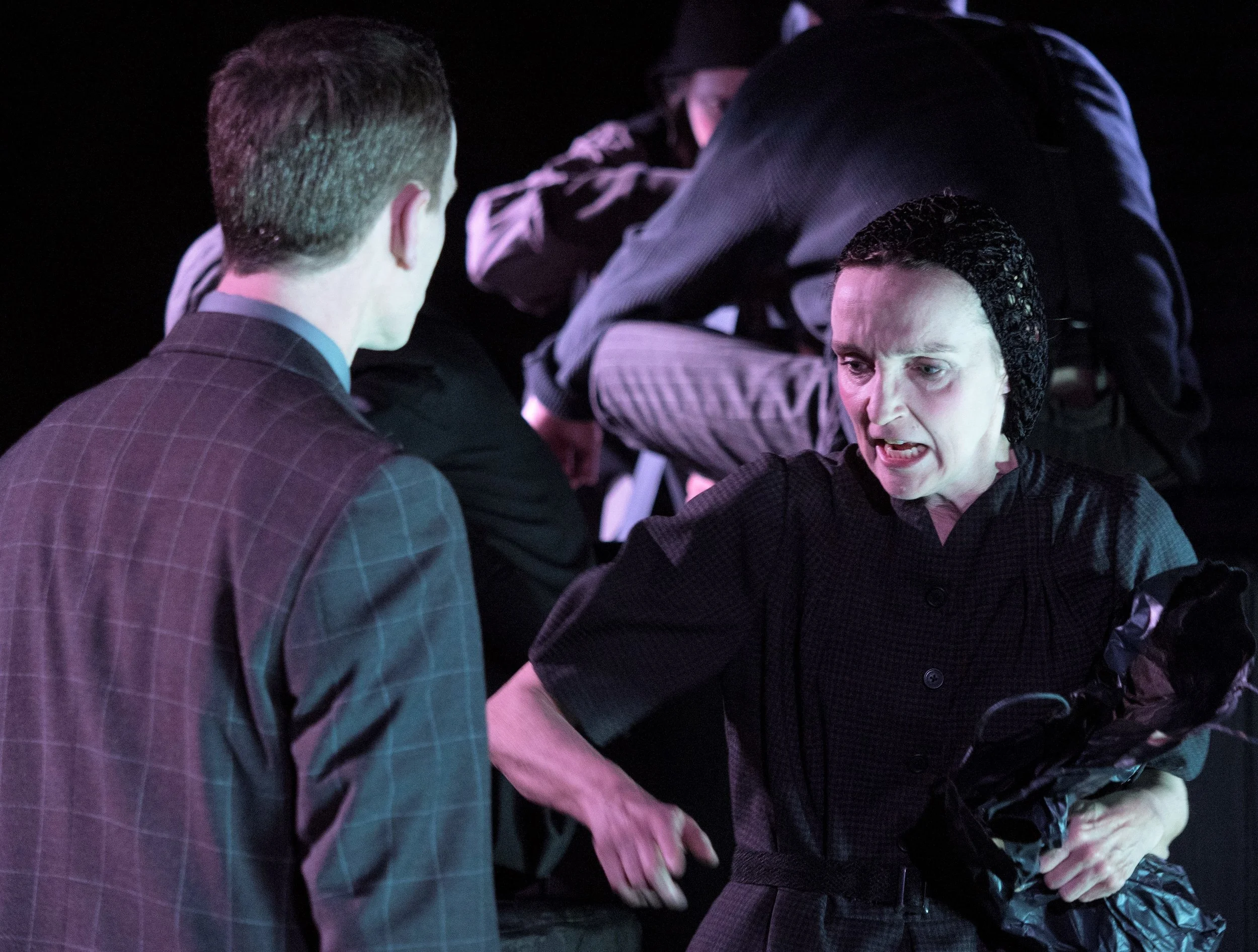 Brian Barnhart as Baby-Face Martin (left) and Laurie Kilmartin as his mother in Sidney Kingsley’s Dead End at the Axis Theatre. Top, from left: Shira Averbuch, Jon McCormick, Regina Betancourt and George Demas as slum dwellers.