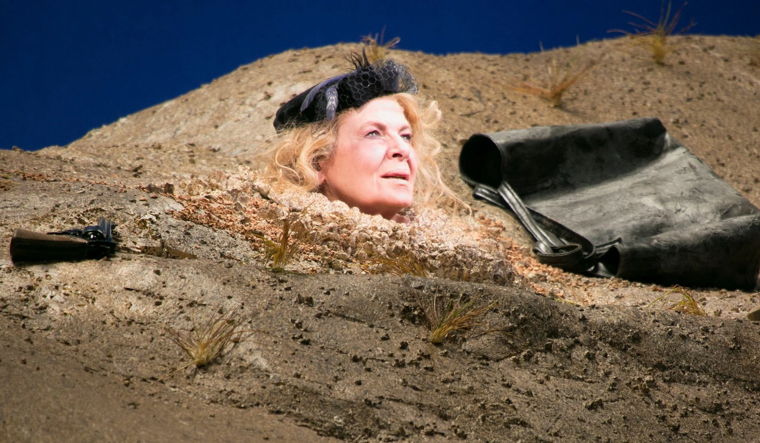 In Act II, Winnie is buried up to her neck. Photos by Gerry Goodstein.