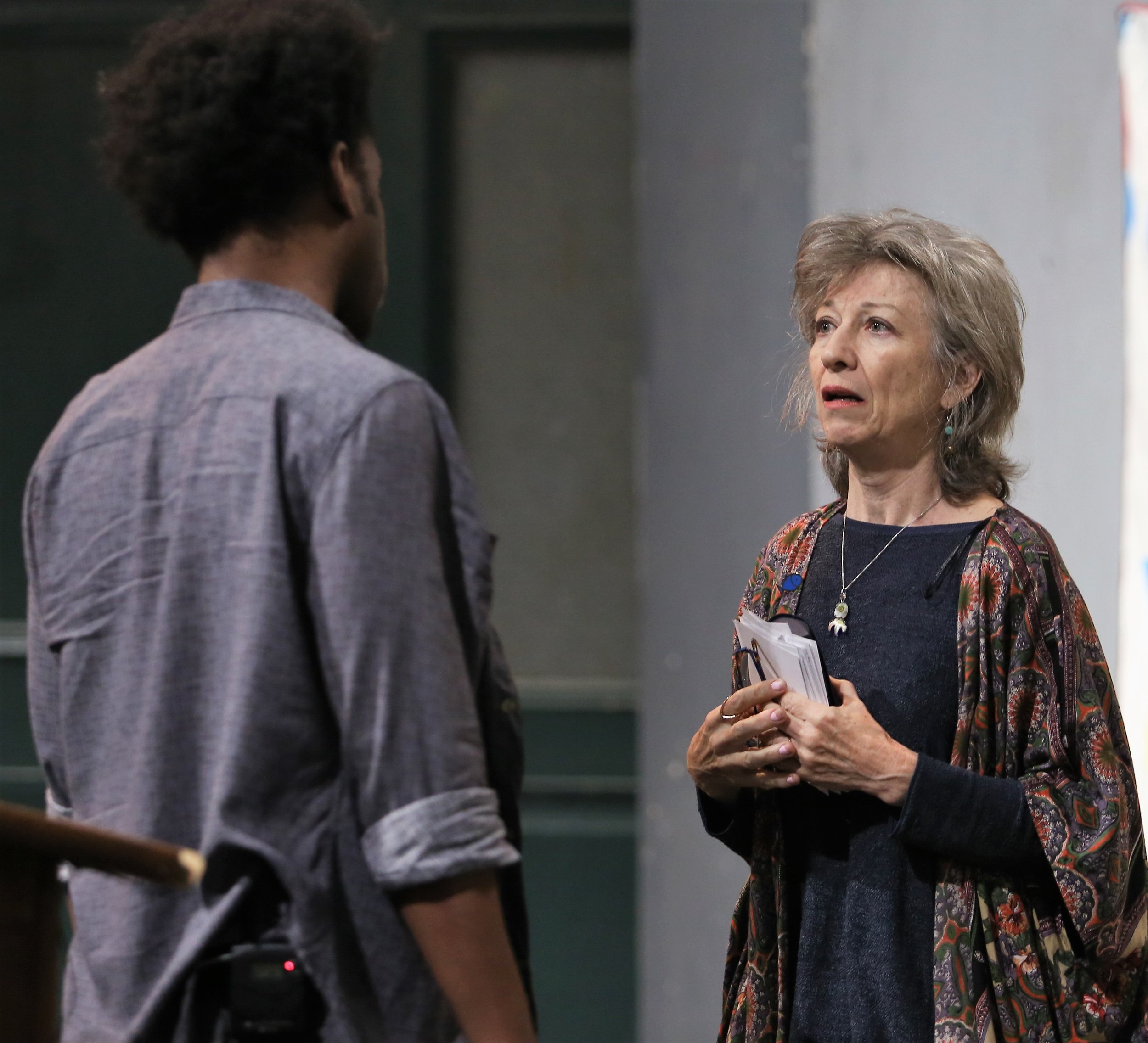 Mikeah Ernest Jennings as James and Anne O'Sullivan as Edna in Master . Photographs by Julieta Cervantes. Top: Jennings with art works by Wardell Millan.