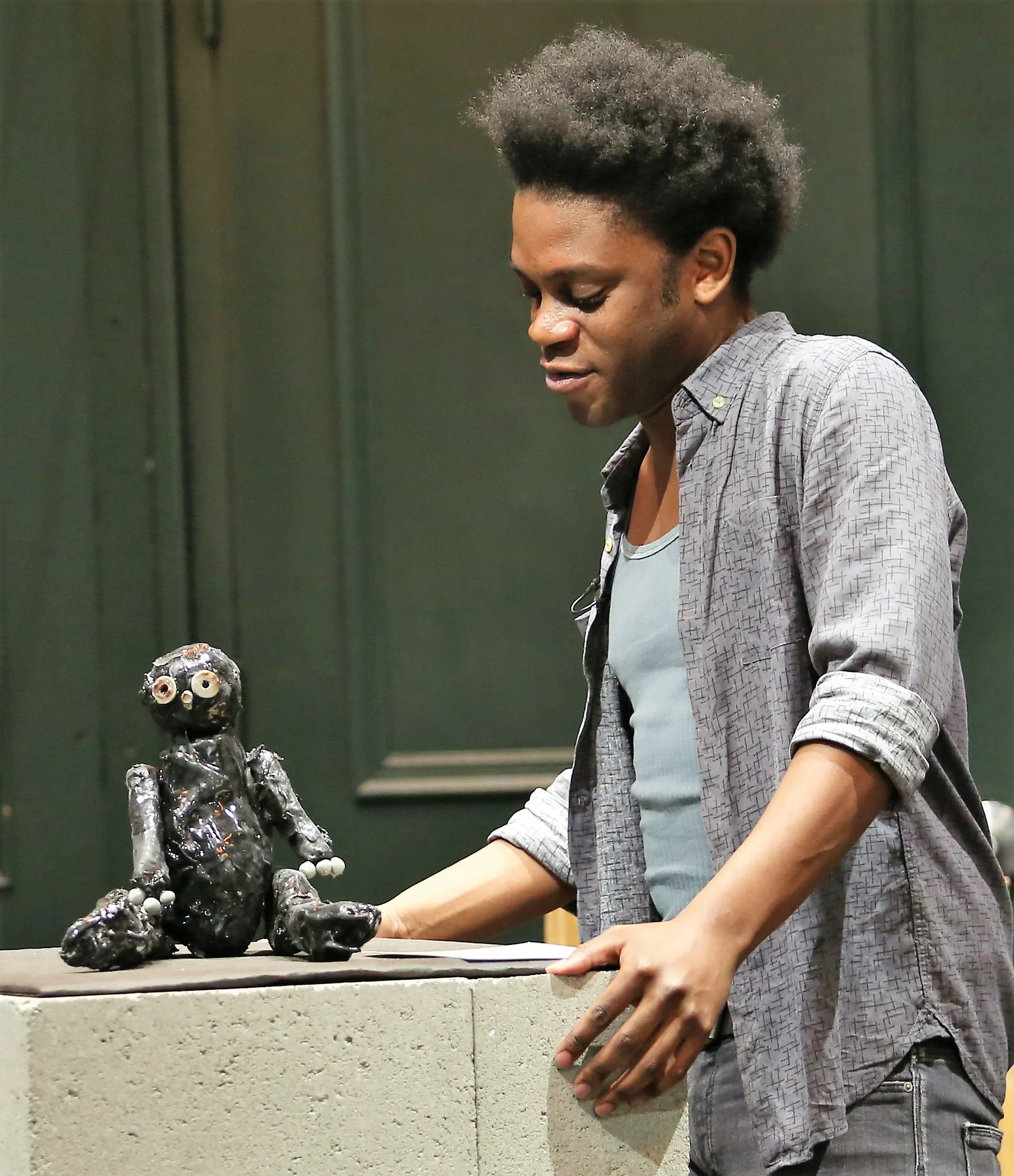 Jennings with sculpture by Millan.