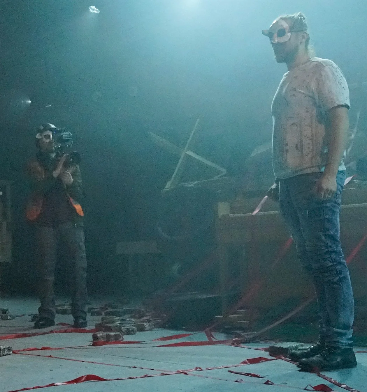 Nathan Deli-Vandenberg (left) and a masked Tamar Ilana in Counting Sheep . Top: Mark Marczyk on the violin (center) is surrounded by the actor-musicians of Counting Sheep. Photographs by Mati Bardosh.