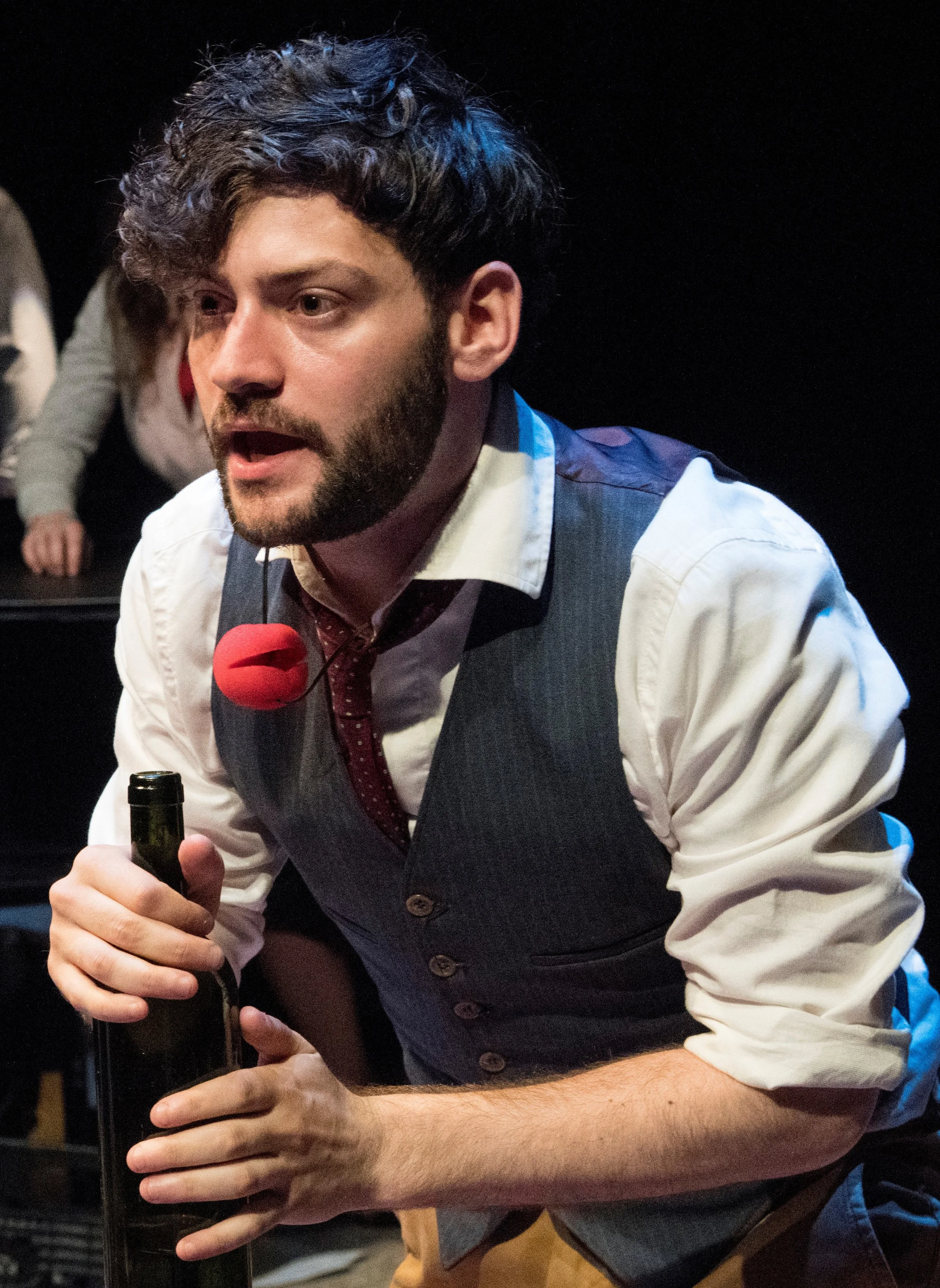Bryan with a bottle of booze and a clown nose in Brecht on Brecht . Photographs by Stan Barouh.