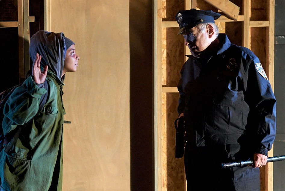 Kara Young as Karma is stopped by Kenneth Tigar as the Police Officer in Jonathan Payne’s The Revolving Cycles Truly and Steadily Roll'd . Top: A young mother (Deonna Bouye) and Karma (Young) brawl.