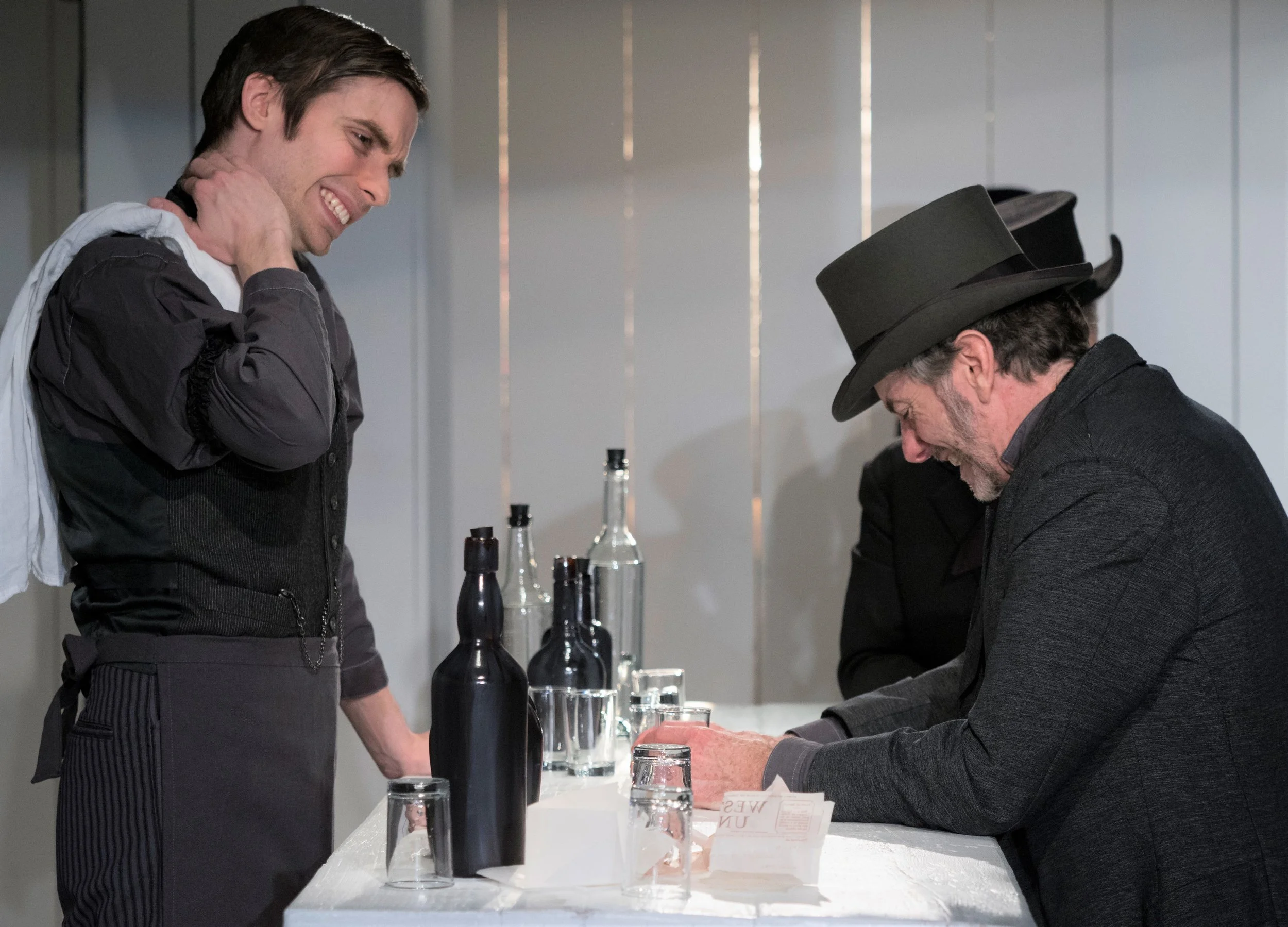 Phil Gellin (left) and Spencer Aste are townspeople in High Noon. Top: Aste, with Jon McCormick (center) as Senator and Brian Barnhart as Marshal Will Barnon.