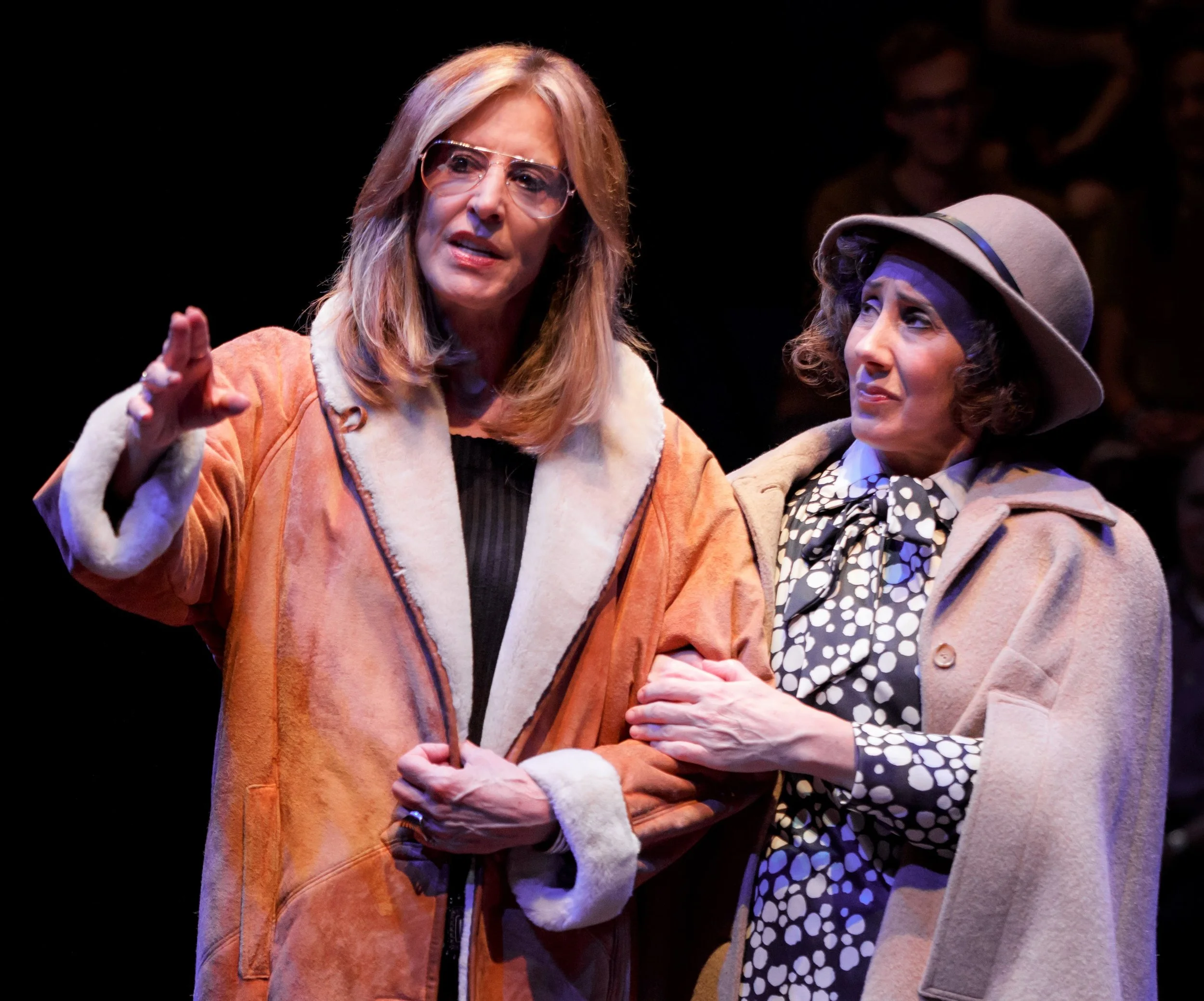 Christine Lahti as Gloria Steinem (left) shares a heartfelt moment with Bella Abzug (Joanna Glushak). Top (from left): Fedna Jacquet, Francesca Fernandez McKenzie, Lahti, Patrena Murray, DeLanna Studi and Liz Wisan act out a protest central to Steinem’s activism.