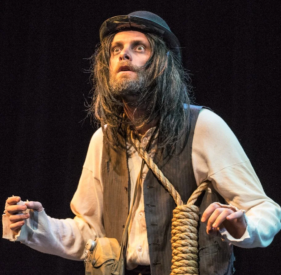 Richard Saudek plays Lucky in the Yiddish translation of Samuel Beckett’s Waiting for Godot. Top, from left: David Mandelbaum as Estragon and Eli Rosen as Vladimir.
