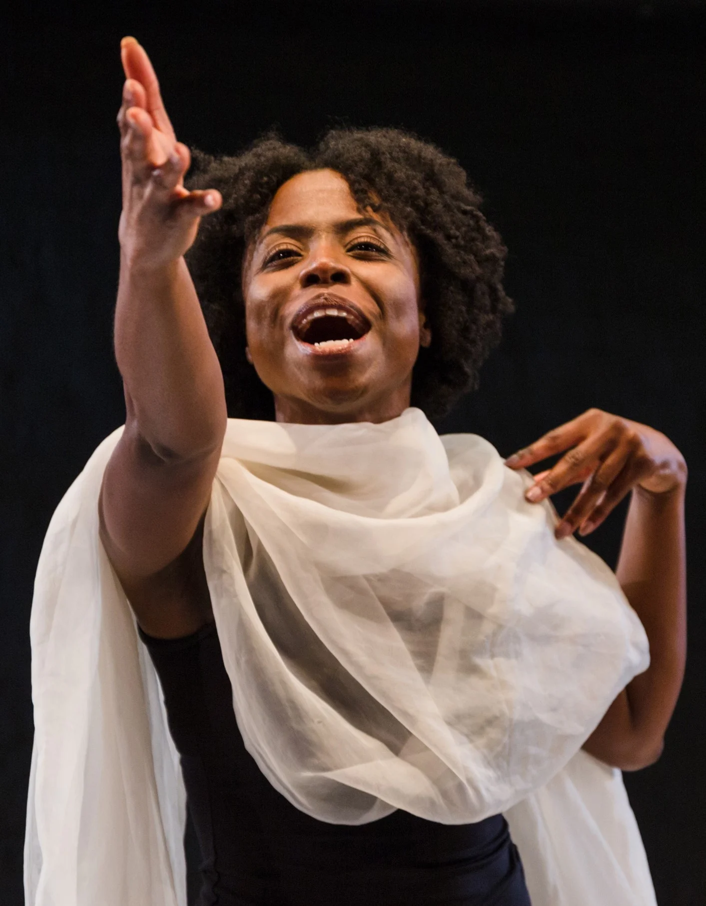 Woman (Ayana Major Bey) delights in an imaginary view. Photographs by Jo Chiang.