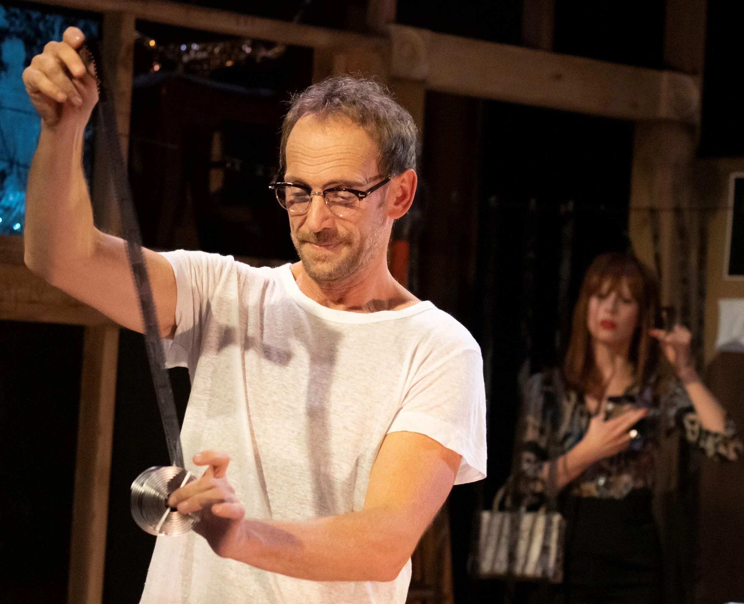 Myth (P. J. Sosko) has a lesson for Skyler (Christina Toth). Photographs by Joan Marcus.