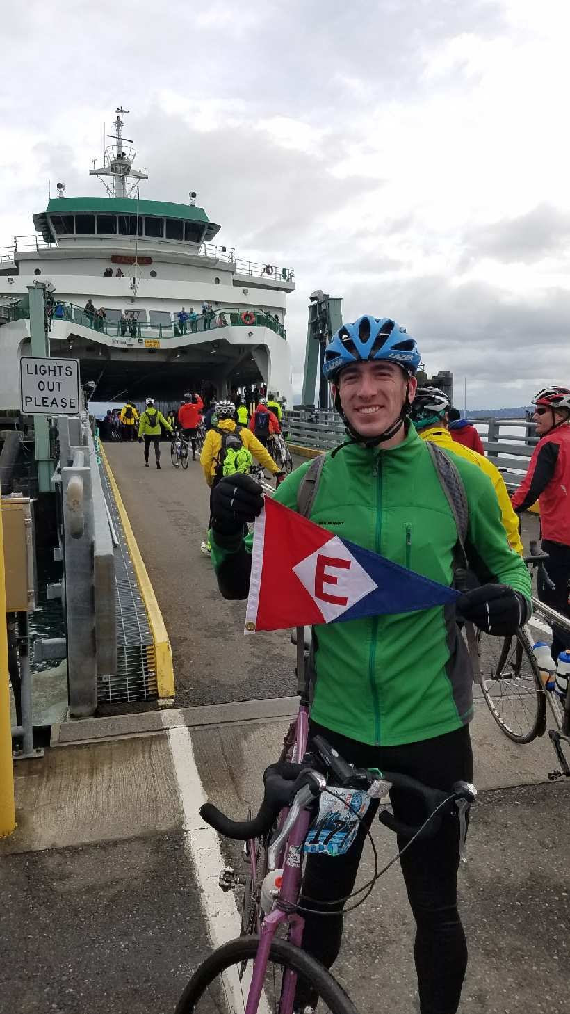  Langdon takes his EYC burgee on the Chilly Hilly bike race on Bainbridge Island, Washington 
