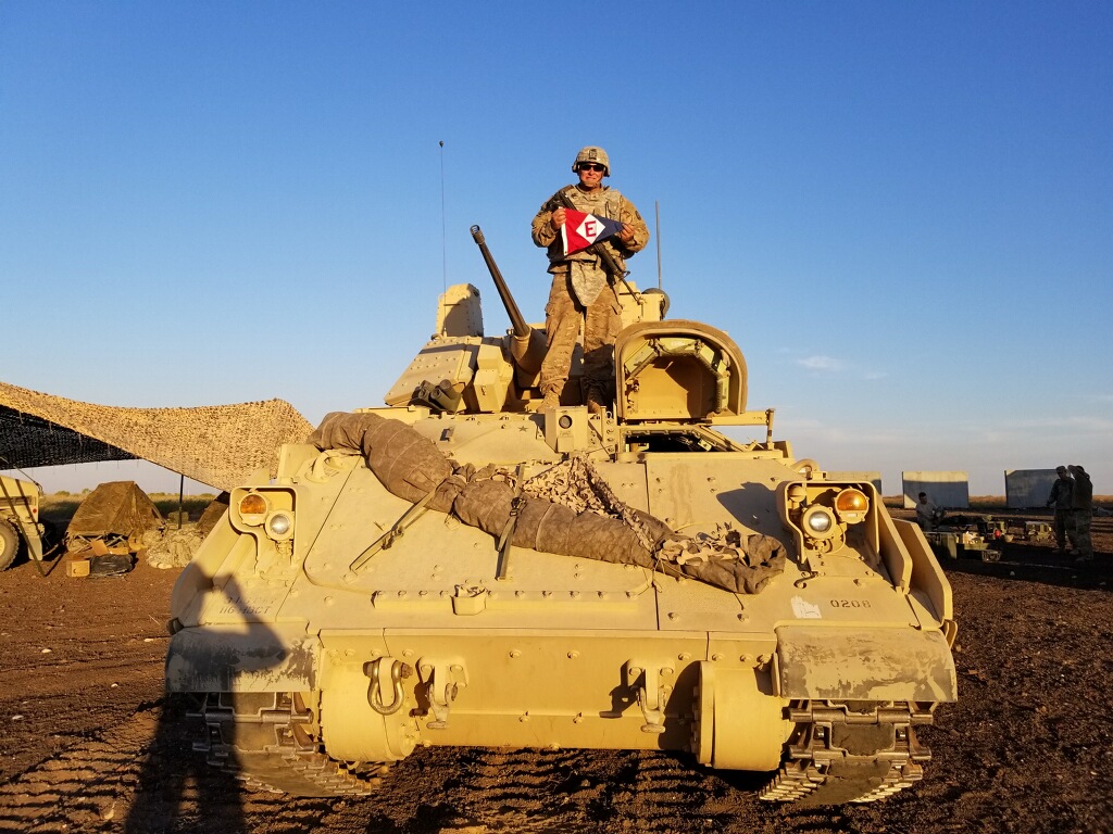  Michael shows his colors atop his ‘land yacht’ during training near Boise, Idaho 