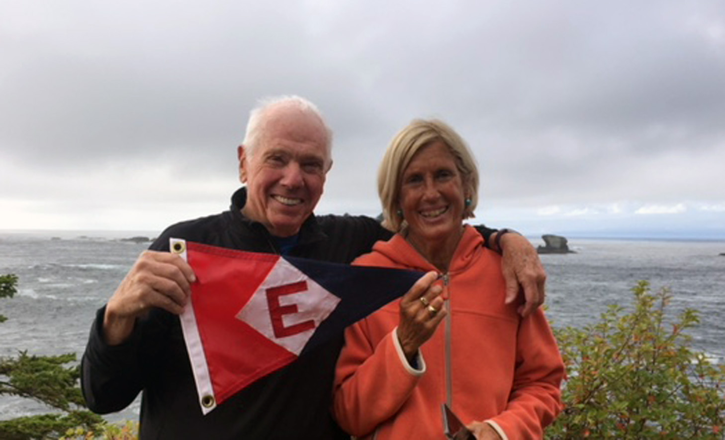  Bill and Nadine show their pride at Cape Flattery, WA—the northwesternmost point of land in the continental United States 