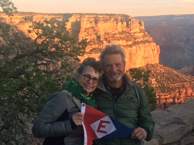  Sheena and Mark—and their burgee—greet the sunrise at the Grand Canyon 