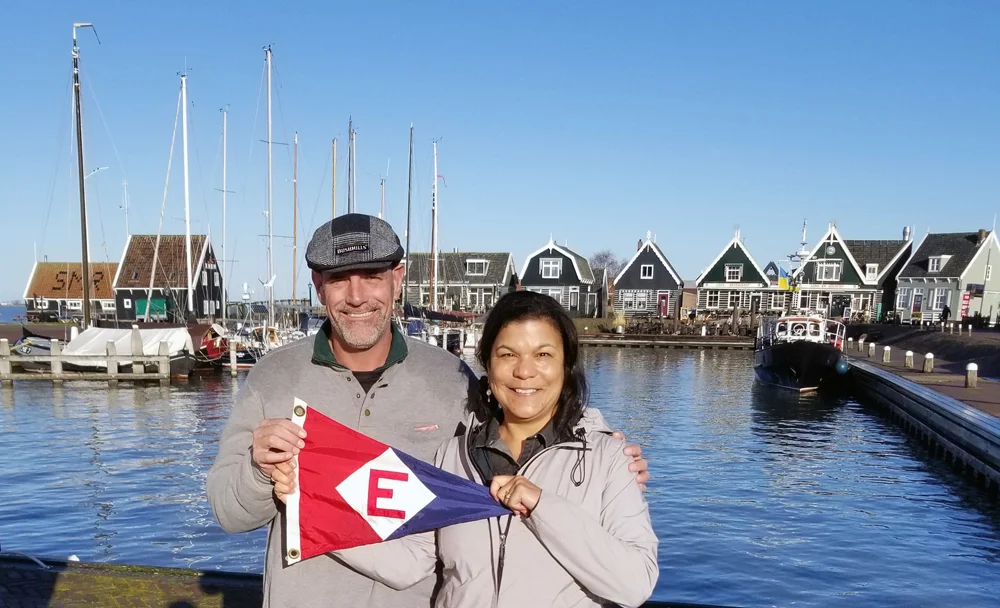 Ken & Tina Hoffman hoist the colors in Marken, The Netherlands.
