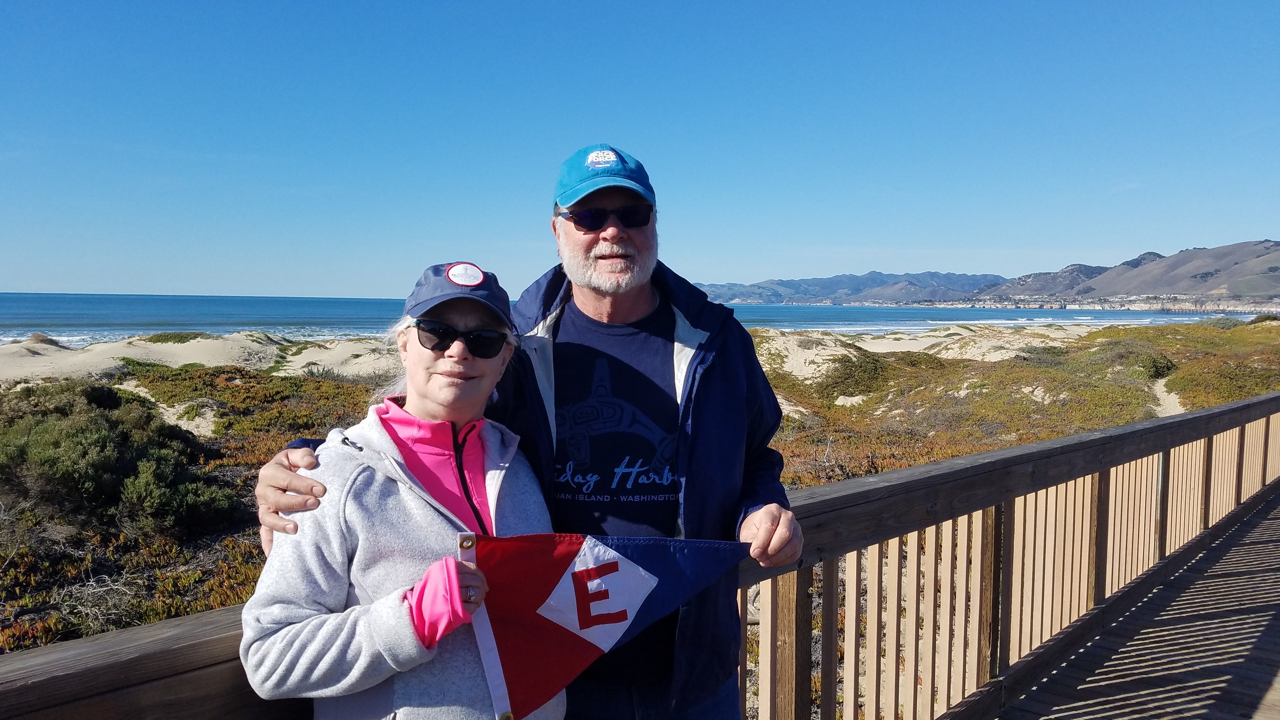  Linda &amp; Murray hoist the colors in Pismo Beach, California 