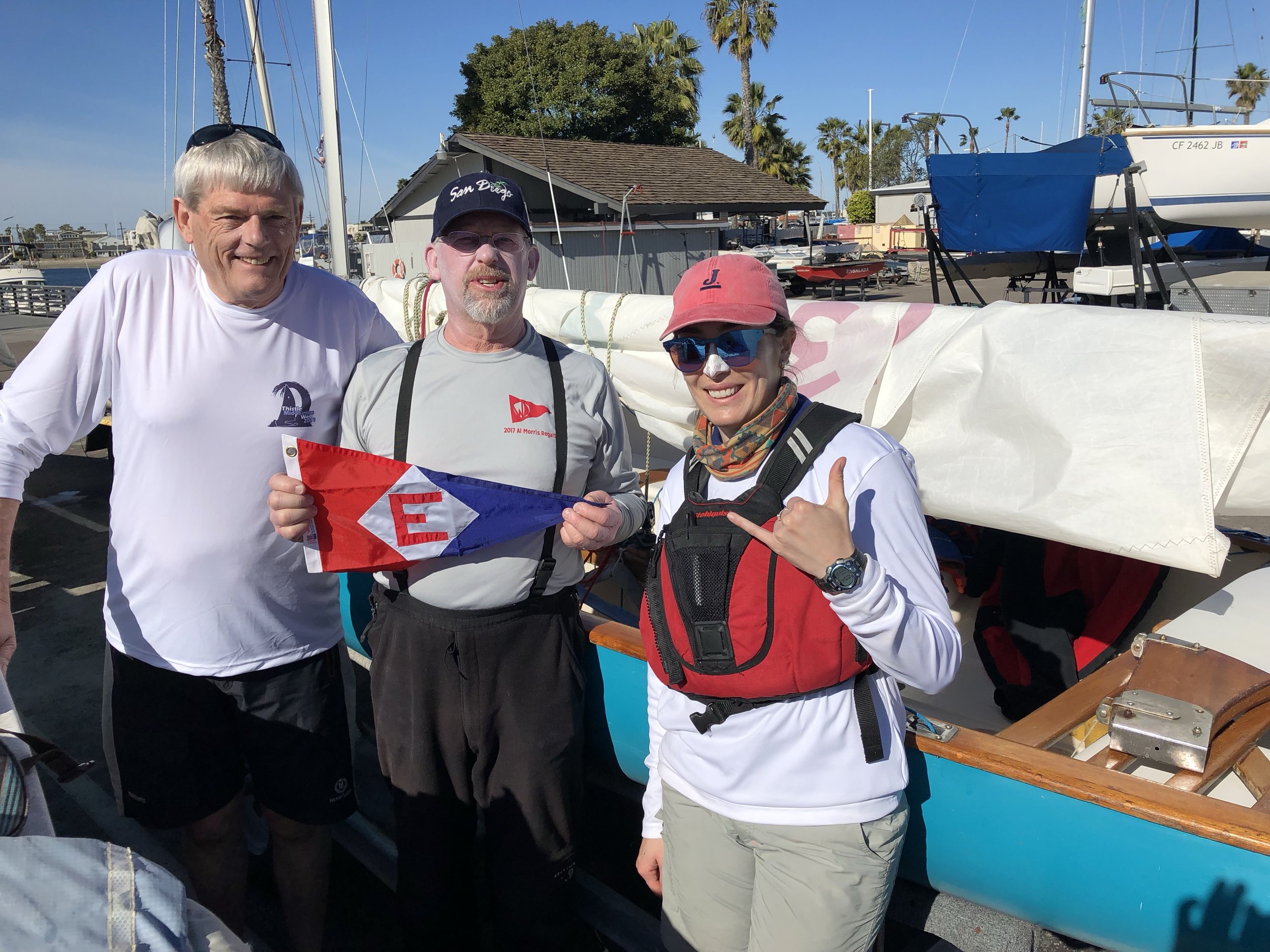  Evert, Chip, and Amanda hoisted the EYC burgee at this year’s Thistle MidWinters West 