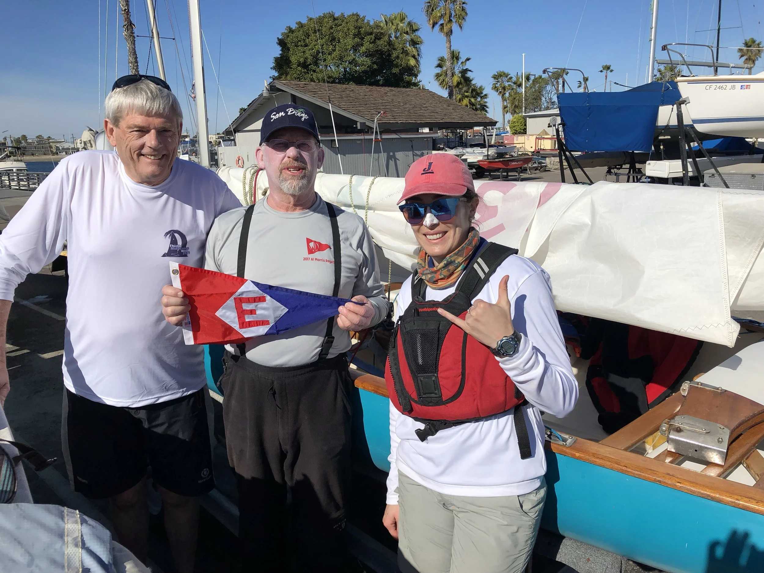 Evert, Chip, and Amanda hoisted the EYC burgee at this year’s Thistle MidWinters West
