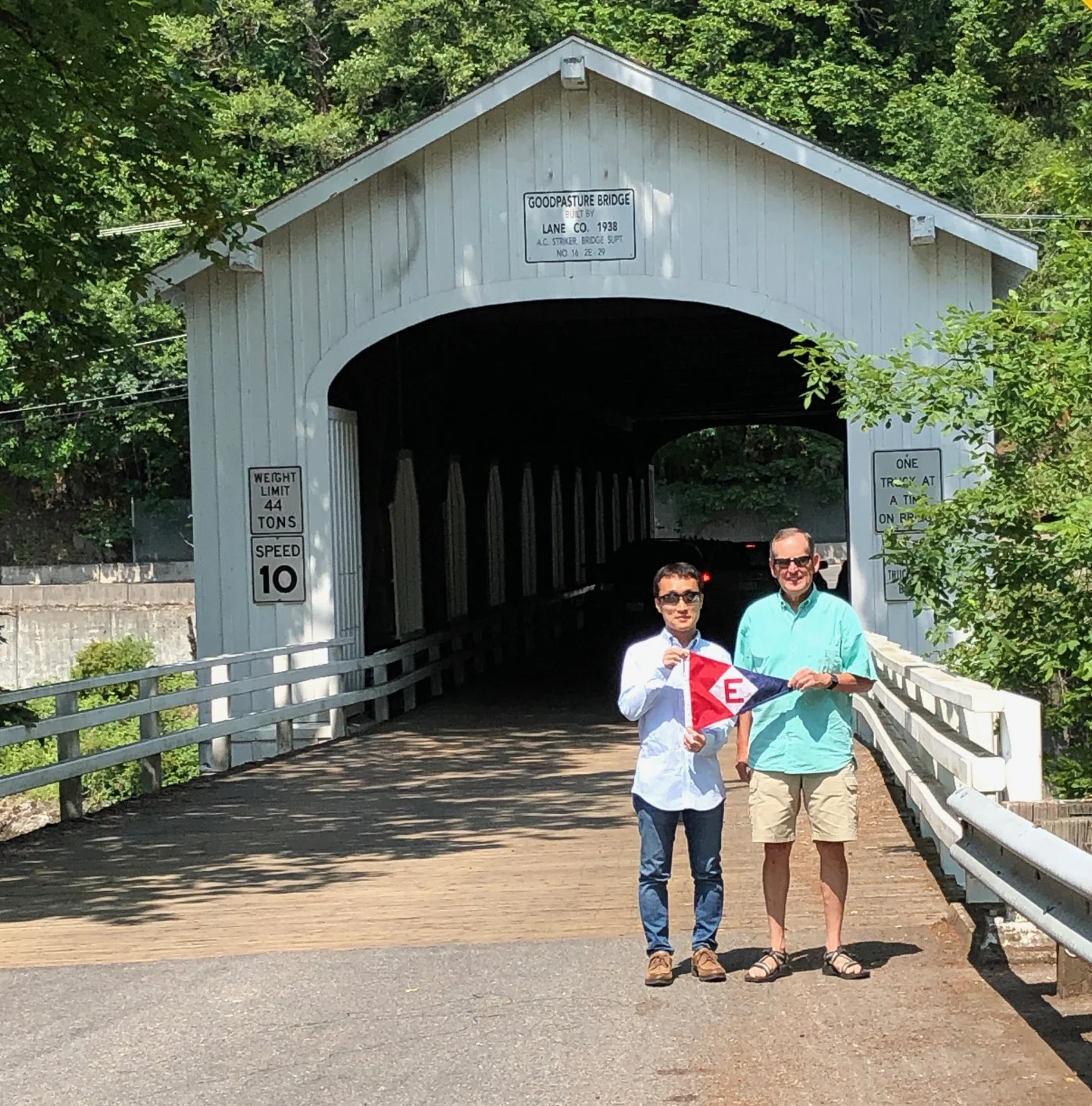Gary Powell and Yoshihiro, a friend visiting from Japan, at the Goodpasture Covered Bridge in Lane County
