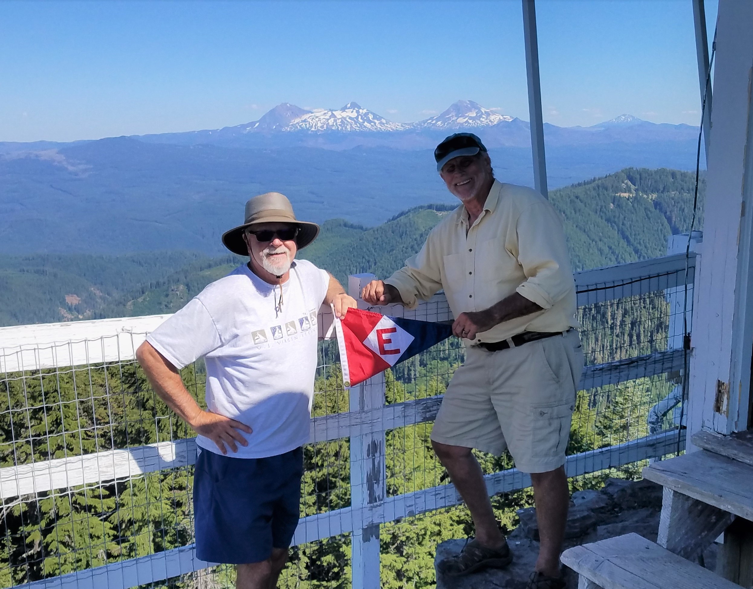  Murray and Scott fly the colors from the top of the lookout at Carpenter Mountain in the Cascades. 