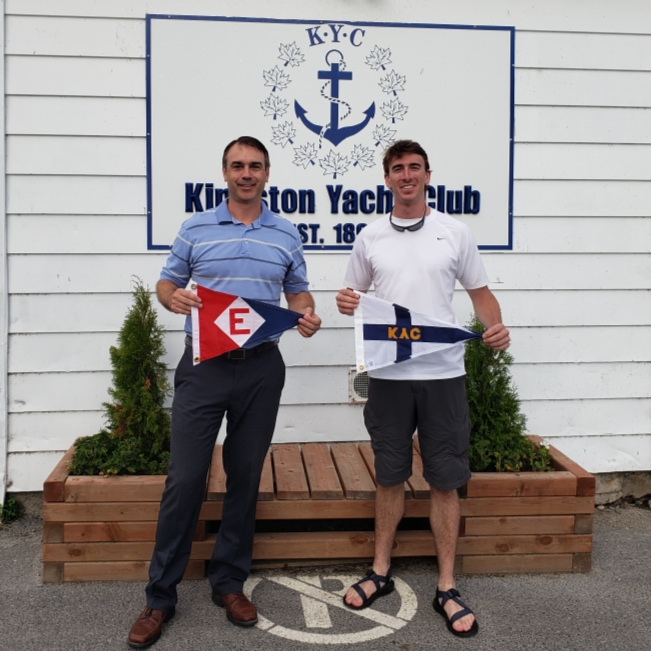  Langdon exchanges burgees with the Commodore of the Kingston Yacht Club in Ontario, Canada 