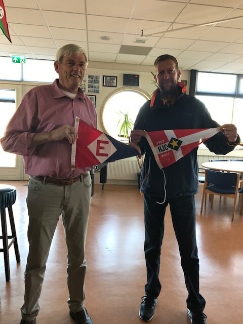  Evert exchanges burgees with the Commodore of the Haarlem Jacht Club in the Netherlands 
