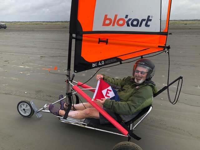  Chris lets the EYC colors fly while landsailing in Ocean Shores, Washington 