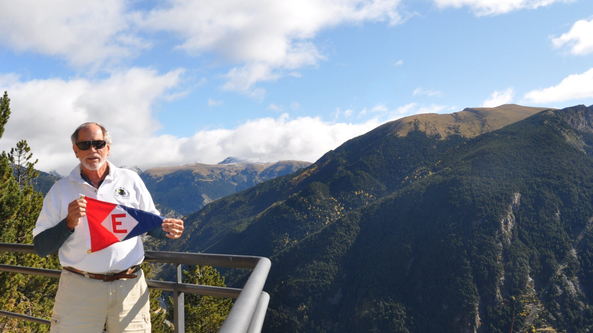  Scott takes the EYC burgee for a hike in Andorra. 
