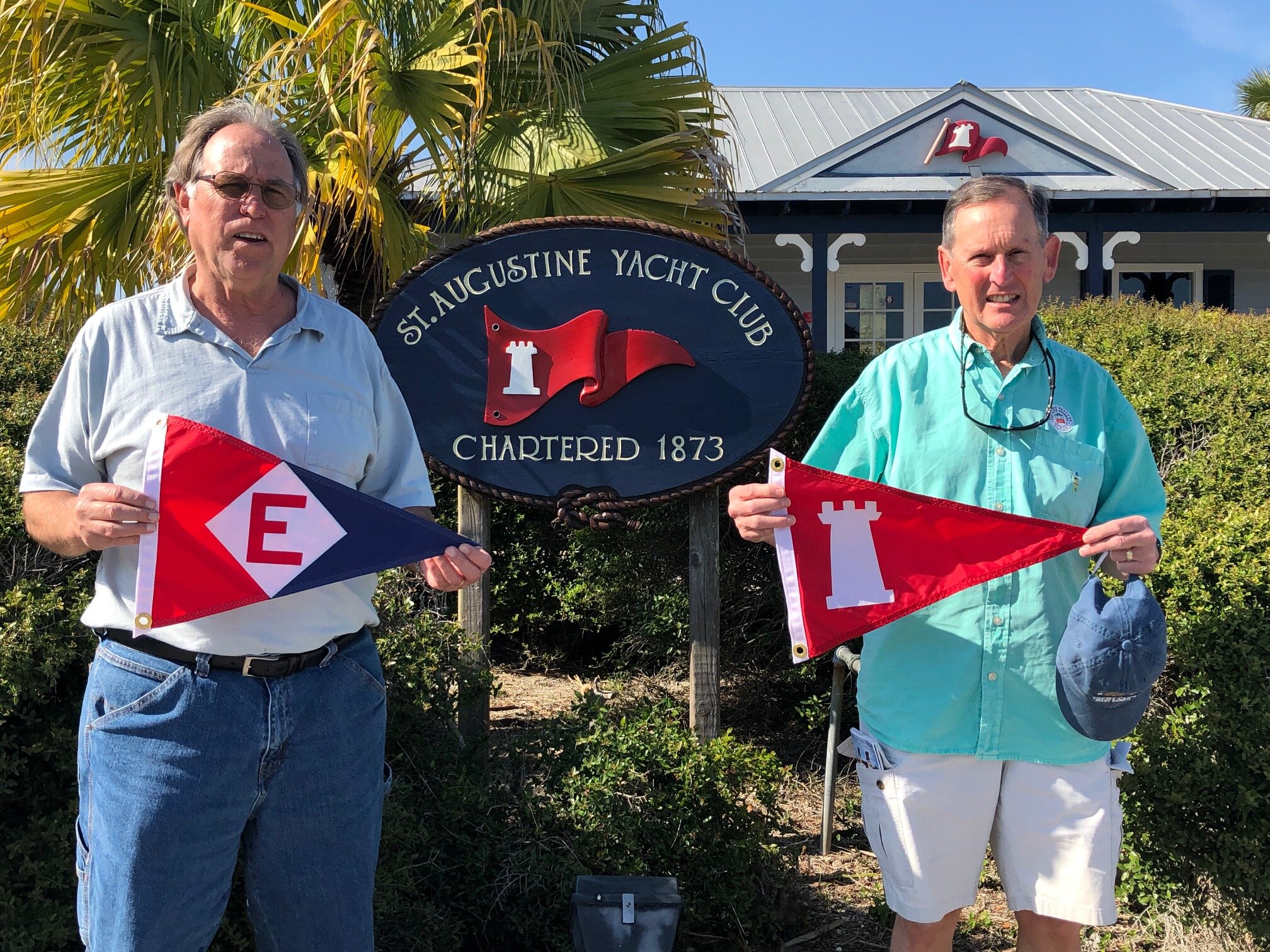  Gary exchanges burgees with the commodore of the St. Augustine Yacht Club in Florida 