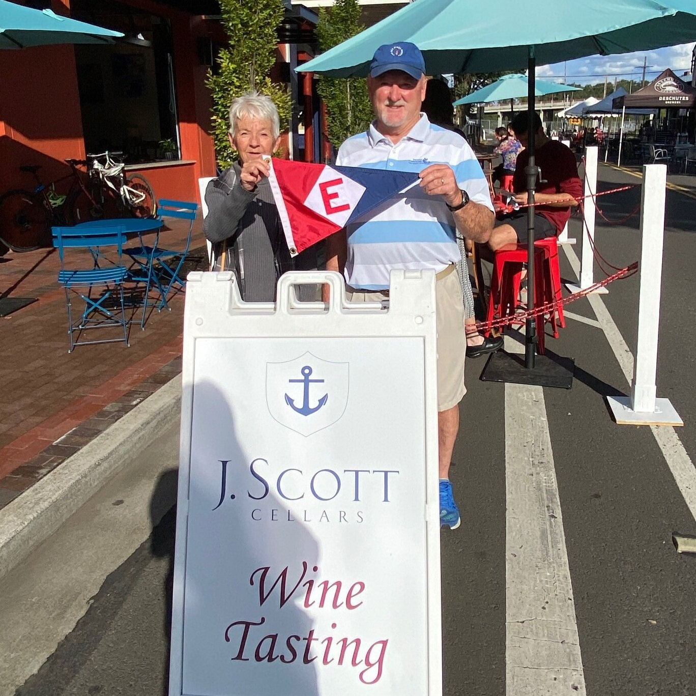 Bonnie &amp; Rex take their burgee out for a little wine tasting at J. Scott Cellars in Eugene 