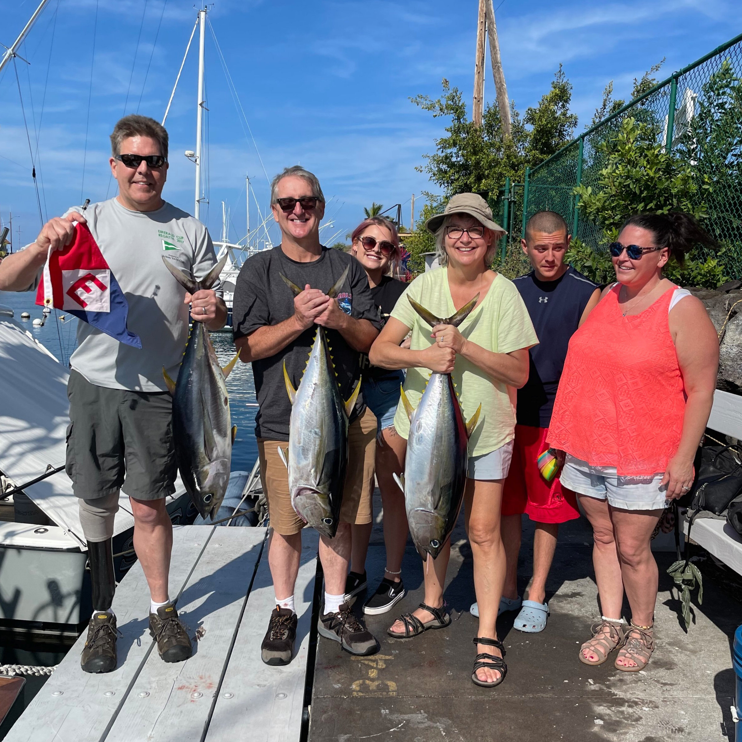  Rob and Deanna and their fishing friends show a lot of pride—its it EYC or those amazing fish? 