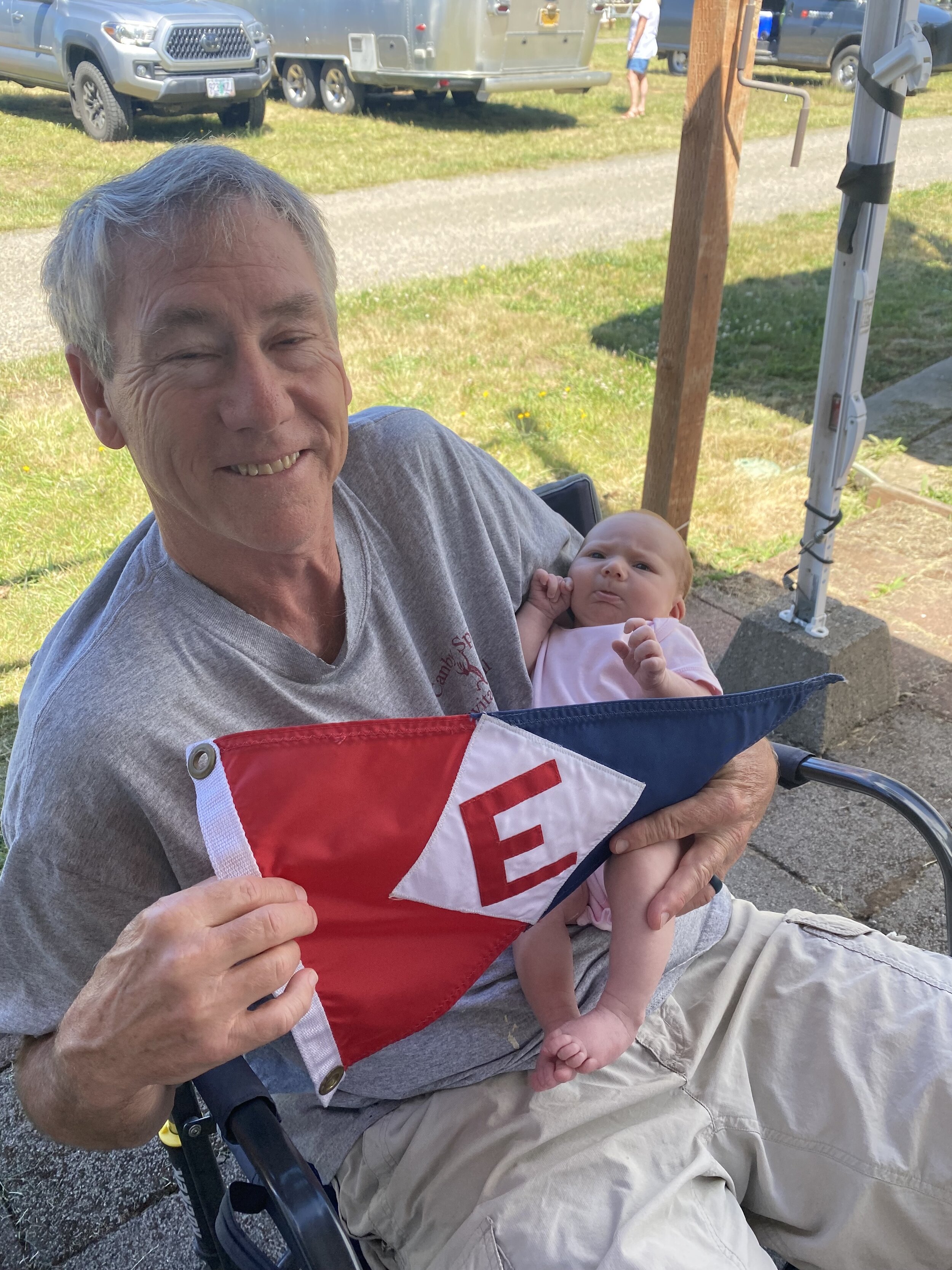  Bill and new granddaughter Sierra take a moment to show their colors 