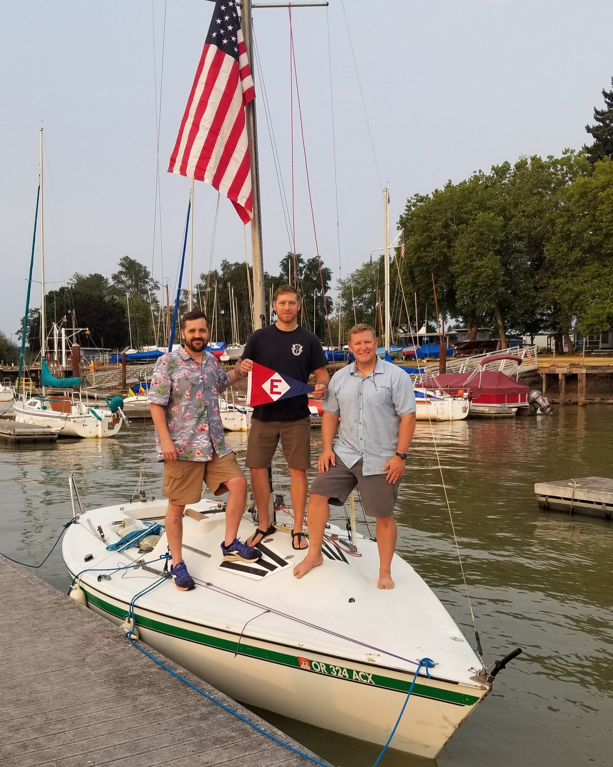  Michael, Joseph, and Andy show their pride during their 24-hour Sail-a-thon Fundraiser for Reboot Recovery 