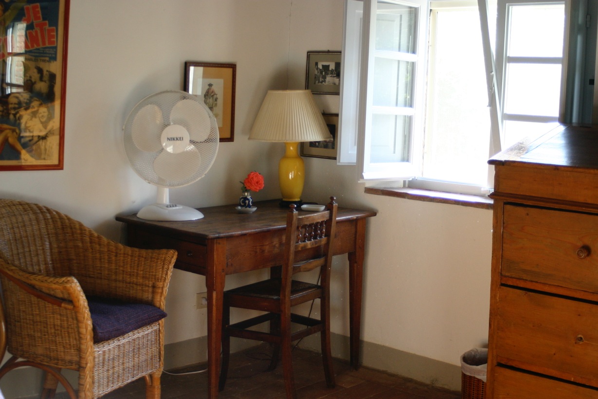 All bedrooms are equipped with fans, window screens, and a variety of antique dressers, armoires, and writing desks.