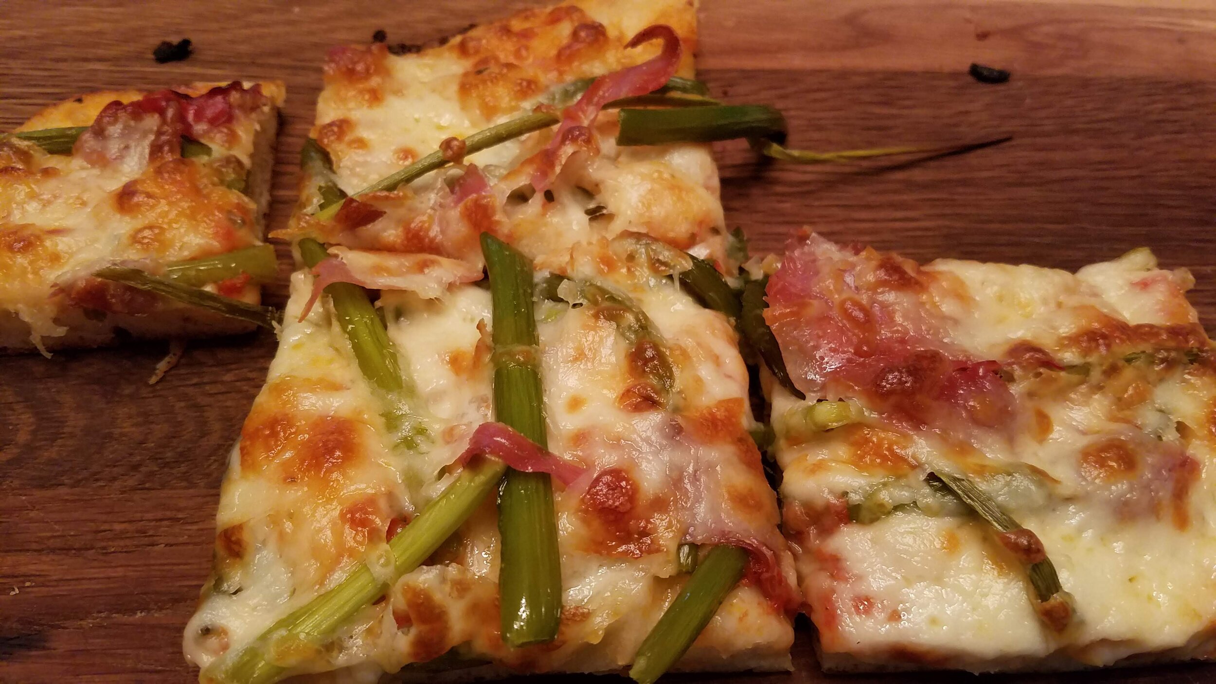 Garlic Scape Pizza with Proscuitto