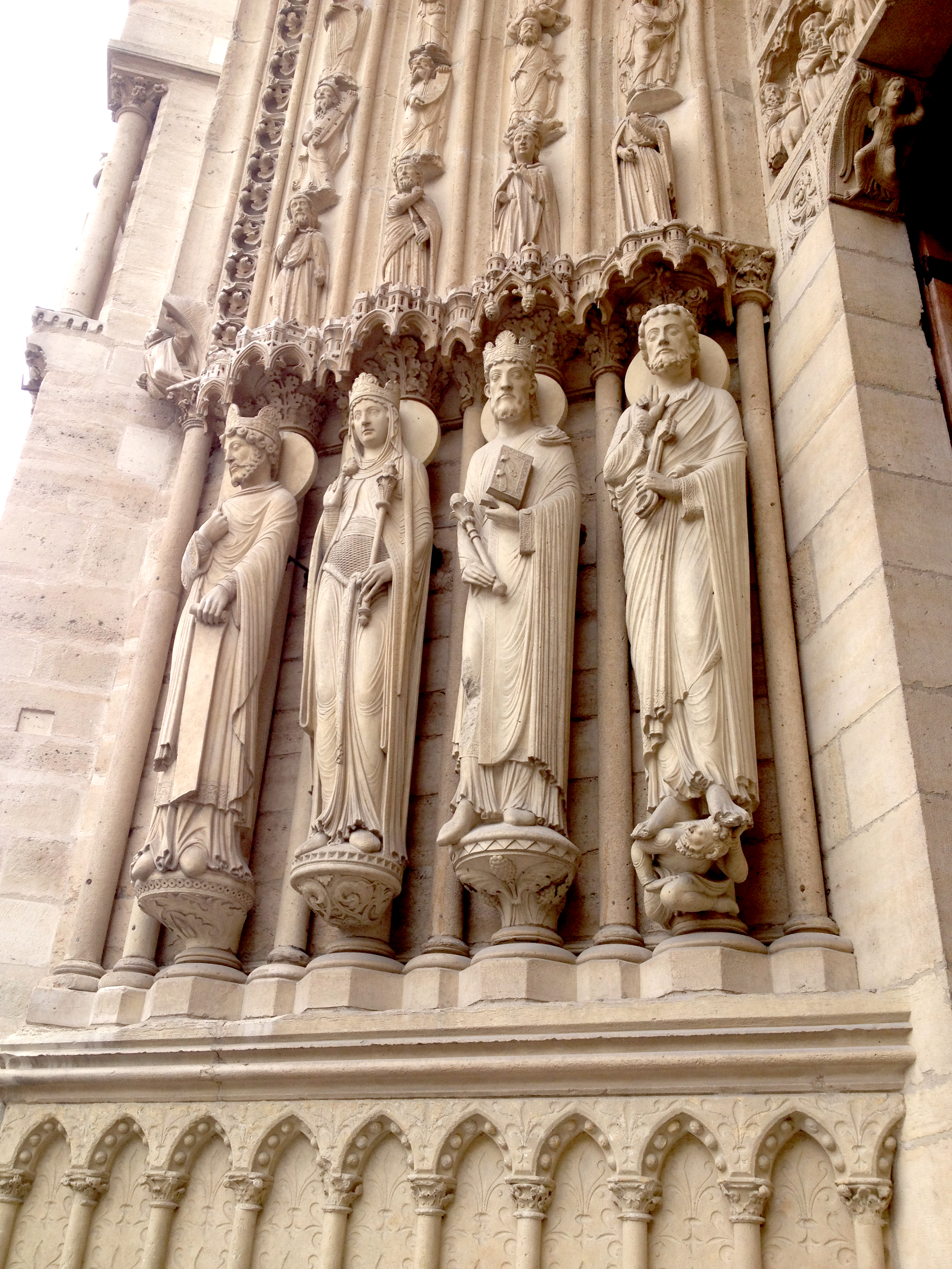  Some of the beautiful carvings at Notre Dame. As a huge Disney geek, I got the soundtrack of 'hunchback' stuck in my head, and took this photo because it reminded me of one of my favorite lines- "You never can run from, nor hide what you've done fro