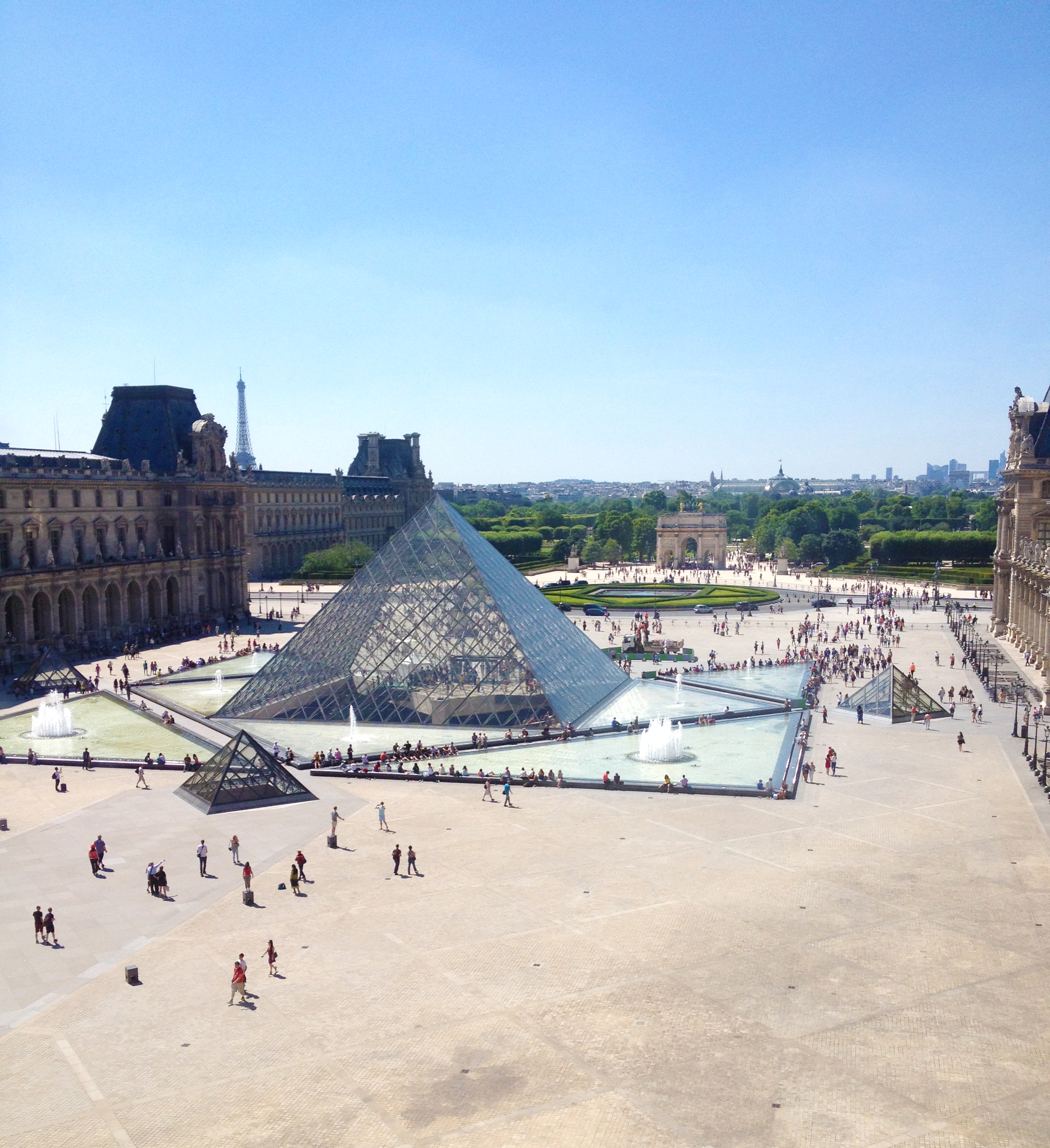  We stopped by the Louvre to say "hi" to Mona, but I was more focused on the views from the building to the courtyard than the art.&nbsp; 