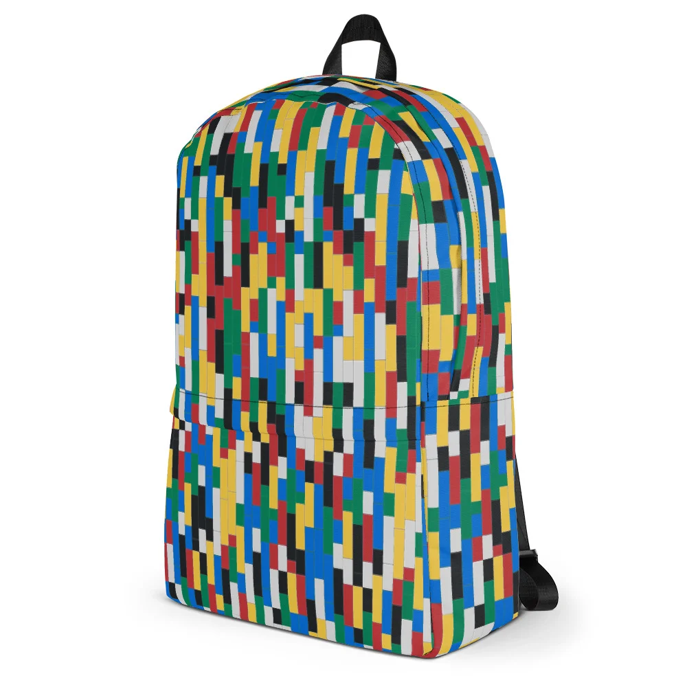 Colorful Building Blocks Backpack, left 3/4 view showing side pocket and multicolored blocks pattern.