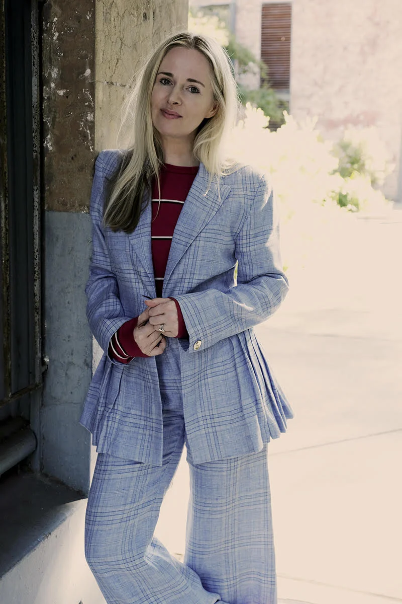 Clare in Maggie Marilyn linen suit and Reformation T-shirt, photographed by Carlotta Moye