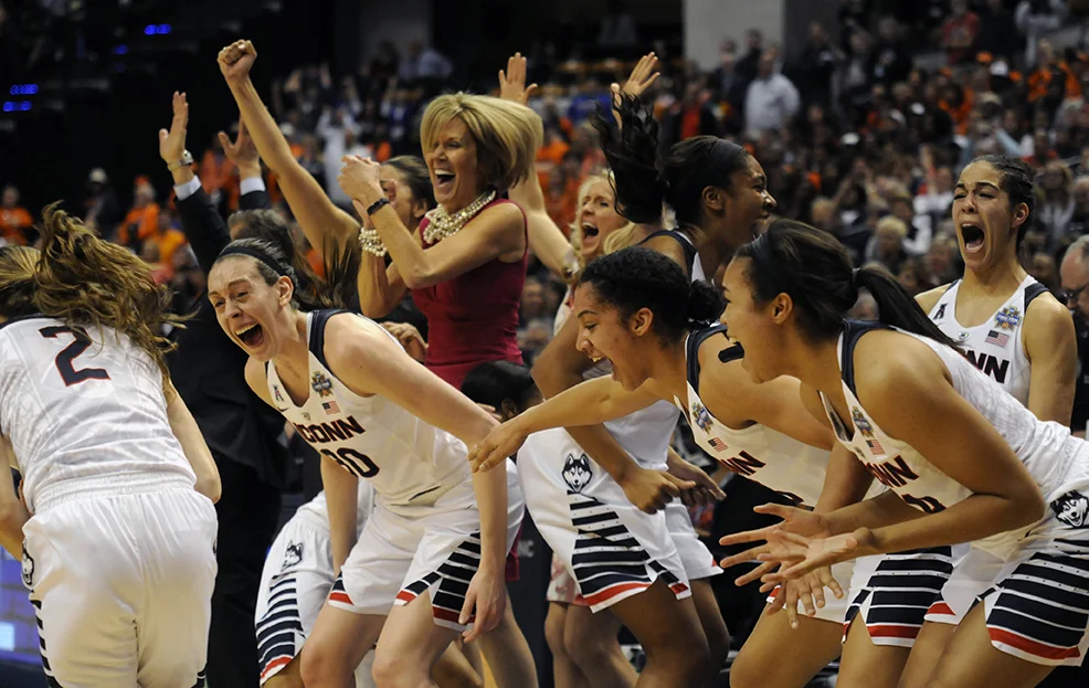 The UConn bench explodes with joy following Briana Pulido jumpshot in the final minute of UConn's 82-51 victory over Syracuse in the NCAA championship game at Bankers Life Fieldhouse in Indianapolis, Ind. on Tuesday April 5, 2016. Pulido, a senior, will graduate with three national championships. 
