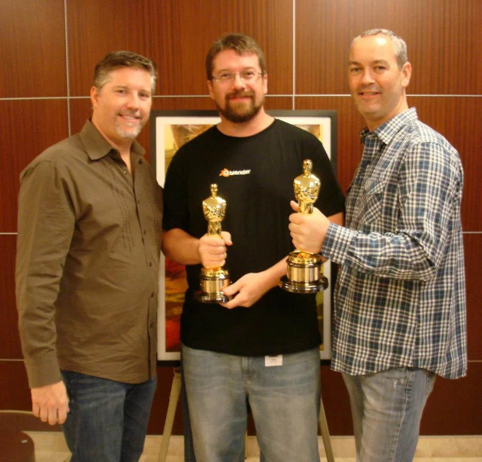Sean Kennedy (guy in the middle), holding the Oscar from Life of Pi.