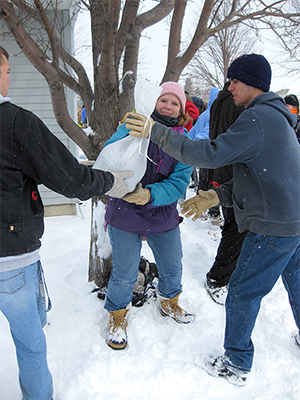 Sandbagging around Moorhead homes along the Red River in 2009.