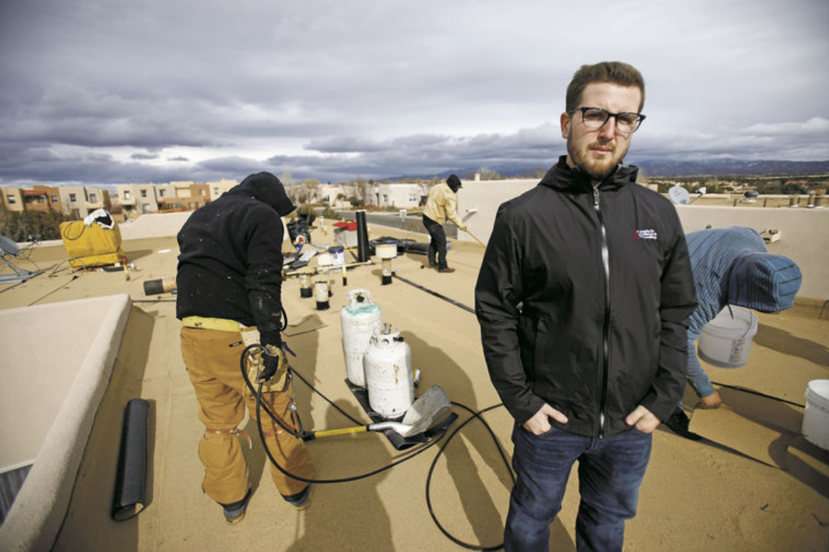 Francis McPartlon, 24, owner of Santa Fe Stucco & Roofing, poses for a portrait at a job site in Santa Fe on Friday, January 19, 2017. The young man took over small roofing company from his dad and has turned it into $6 million operation -- one of biggest roofing companies in state. Luis Sánchez Saturno/The New Mexican