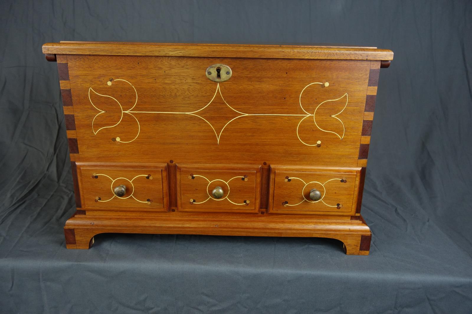  Line and berry inlay chest 